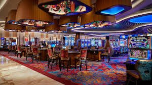 Live blackjack table with dealer and real cards at Evolution Gaming studio